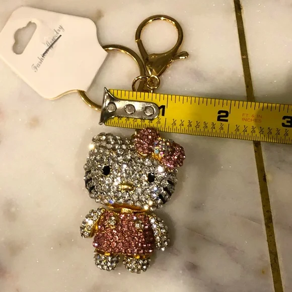 ✨NWT✨ Hello Kitty Crystals Bow Gold Metal Keychain Purse Clip - Picture 7 of 7